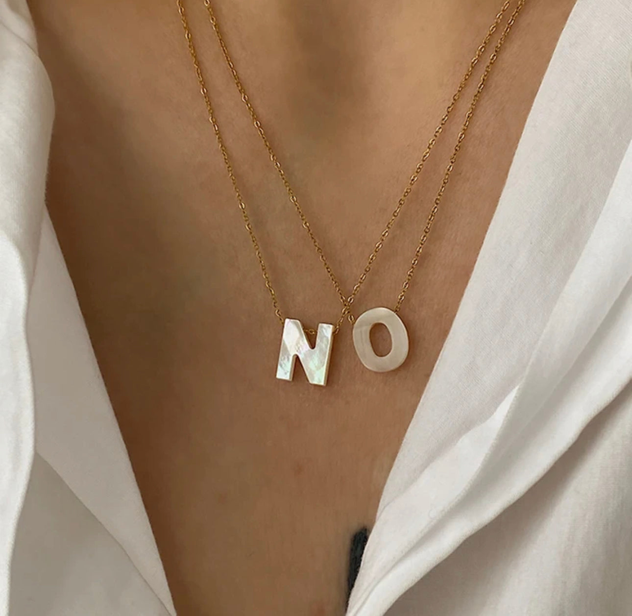 Initials in mother-of-pearl