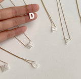 Initials in mother-of-pearl